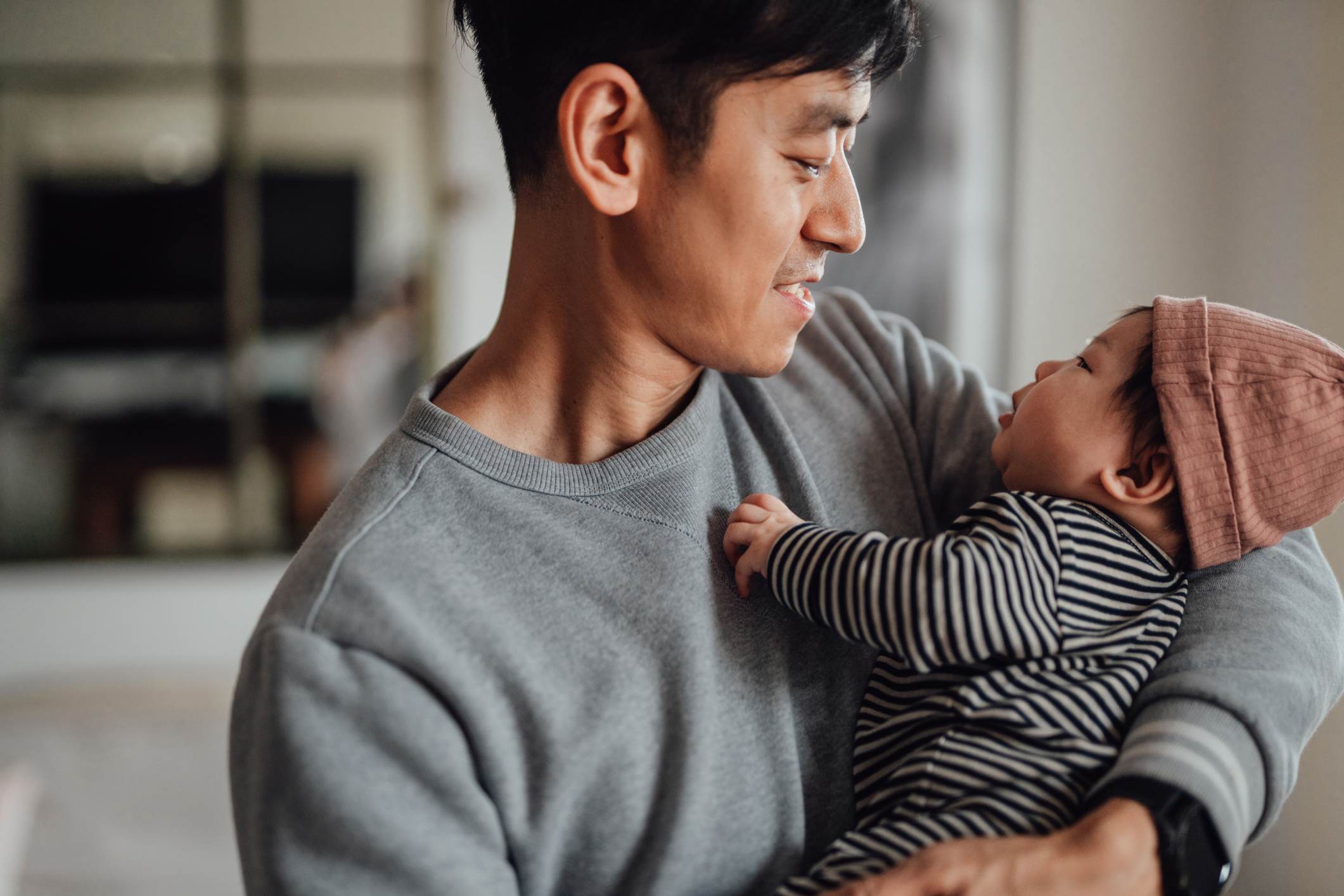 Asian-father-holding-his-cute-baby-career-break