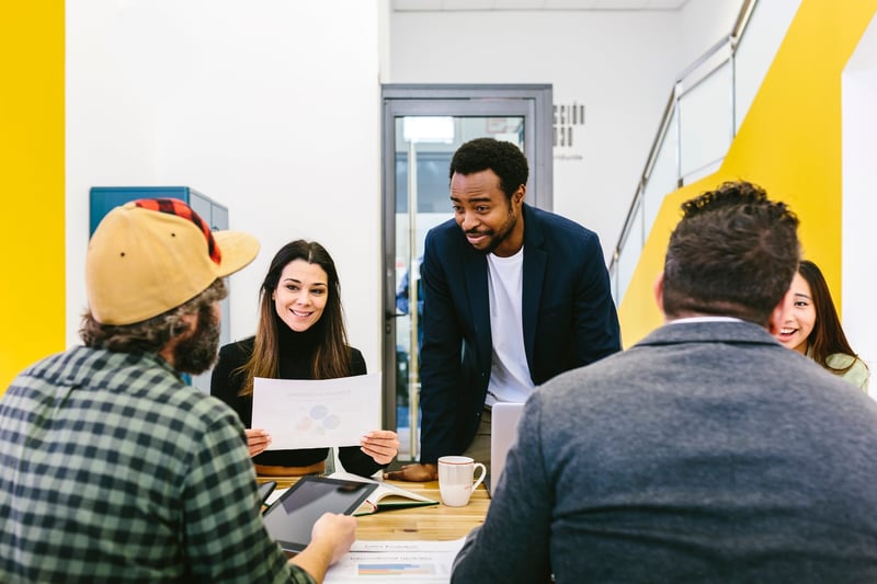 Business-People-At-Table-In-Modern-Office