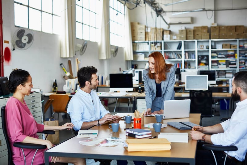 Business-People-Having-Discussion-In-Office