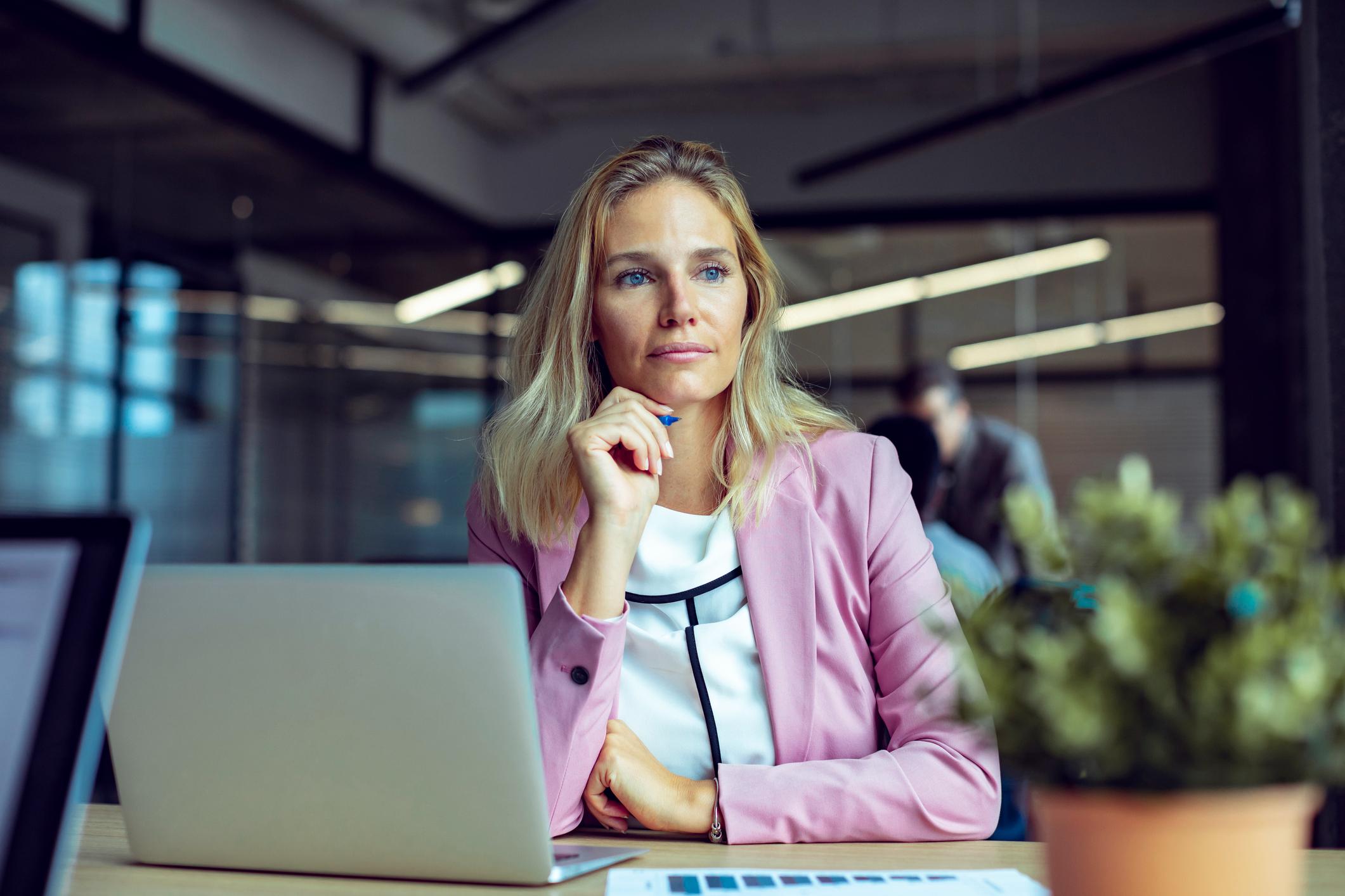 Close-up-of-a-young-businesswoman-working-in-an-office-fear-of-disappointing-others