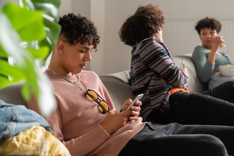 Man-Using-Smartphone-In-Meeting-what-is-social-health
