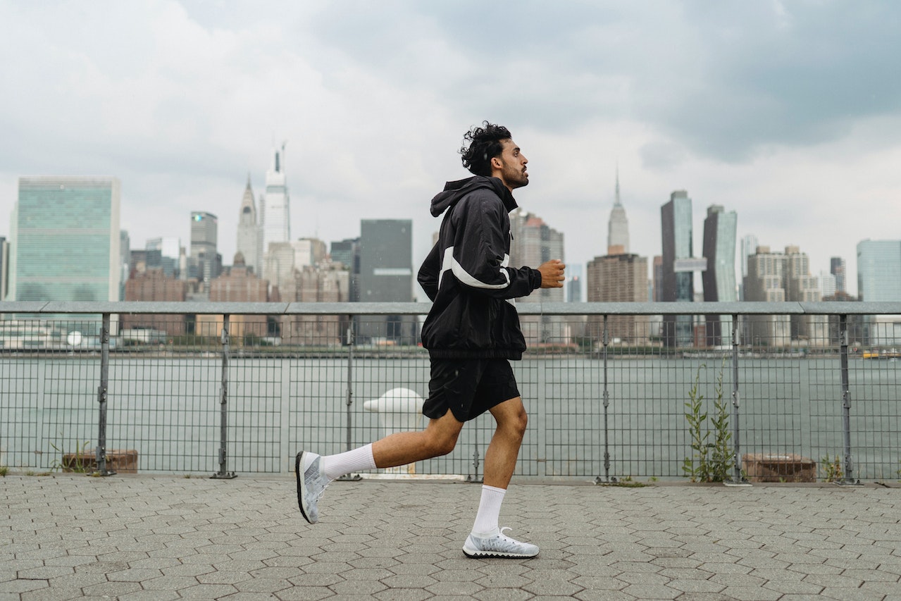 Man-running-outdoors-on-gloomy-day-things-to-manifest-ideas