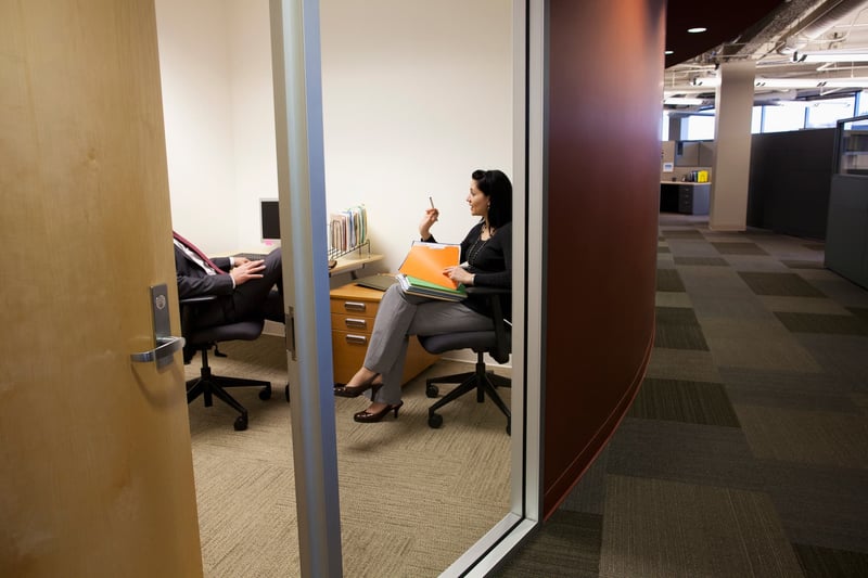 Meeting-Between-Man-And-Woman-what-is-the-open-door-policy-workplace