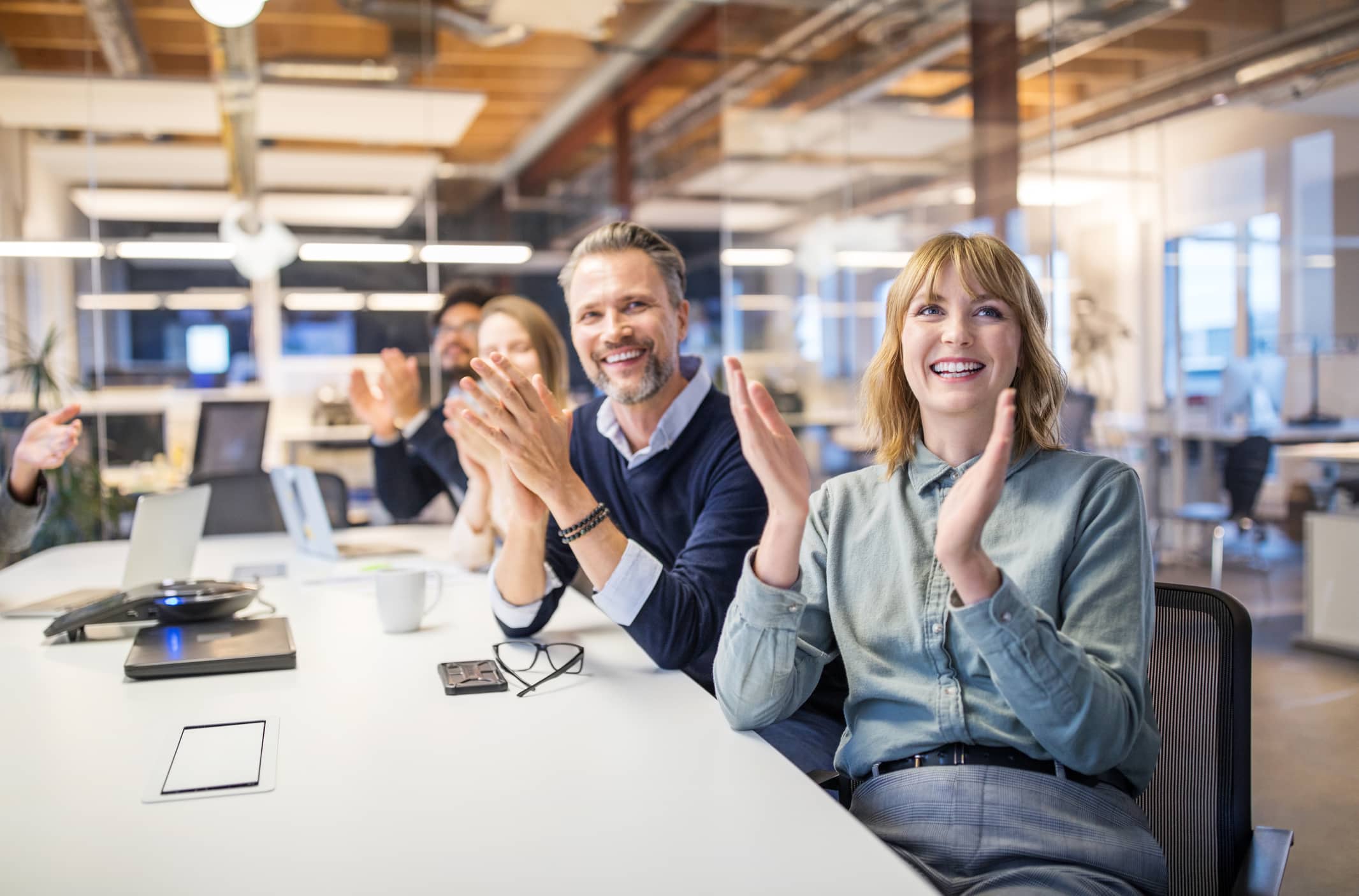 Multi-ethnic-business-group-applauding-in-meeting-smart-goals-examples