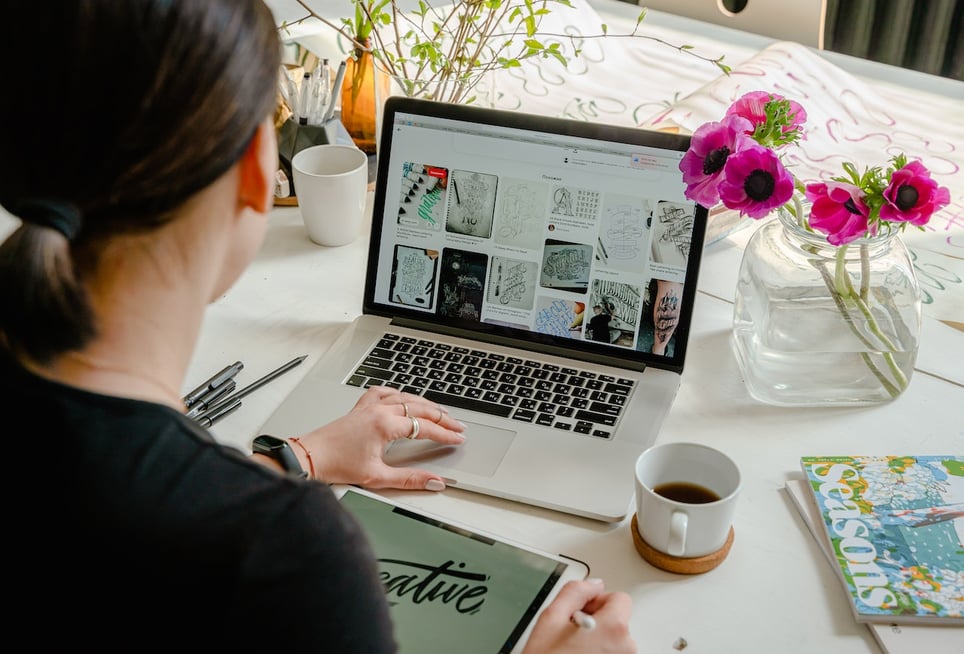 Person-Using-Laptop-For-Graphic-Designshow-to-get-inspired