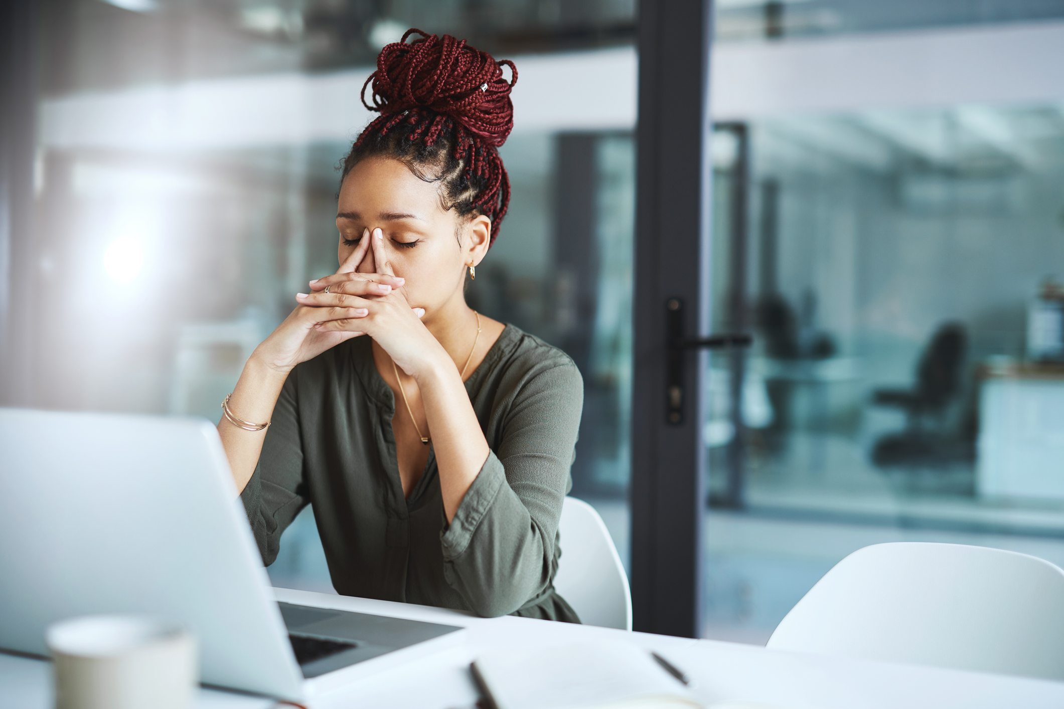 Shot-of-a-young-businesswoman-looking-stressed-fear-of-disappointing-others