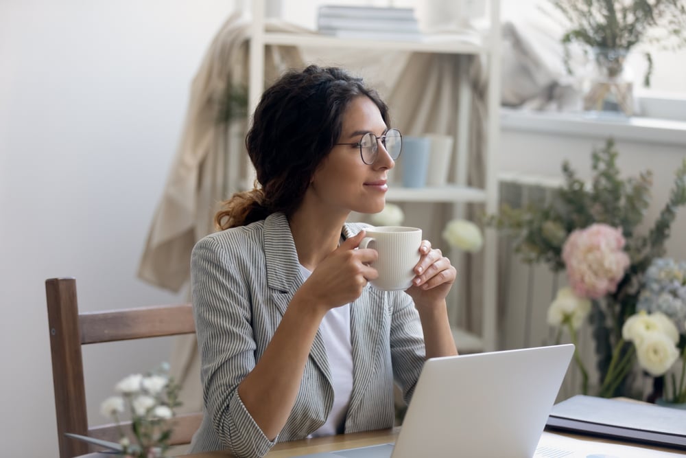Smiling-young-Caucasian-businesswoman-in-glasses-hard-work-vs-smart-work