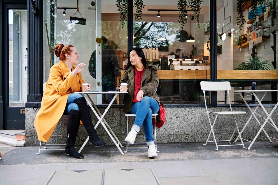 Two-friends-outside-coffee-shopTwo-friends-outside-coffee-shop-what-are-friendship-goals