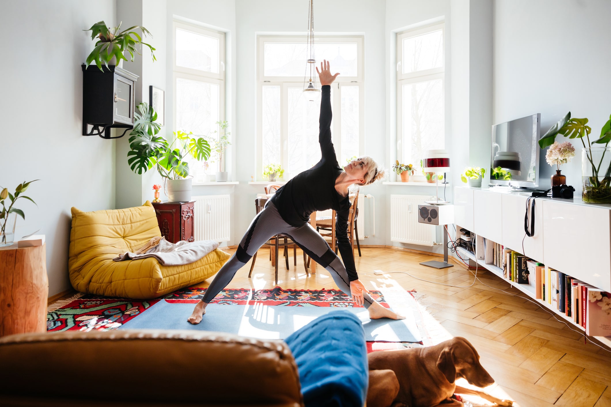 Woman-Stretching-Doing-Yoga-At-Home-monthly-goals-examples