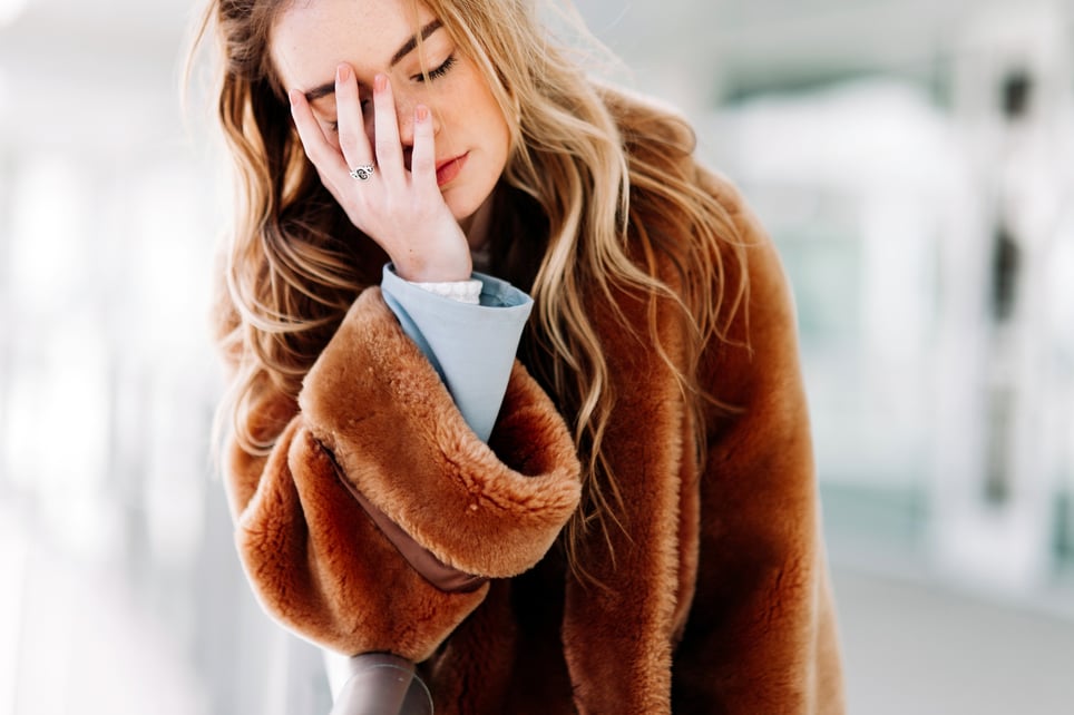 Tired-Woman-Touching-Her-Face-how-to-get-motivated