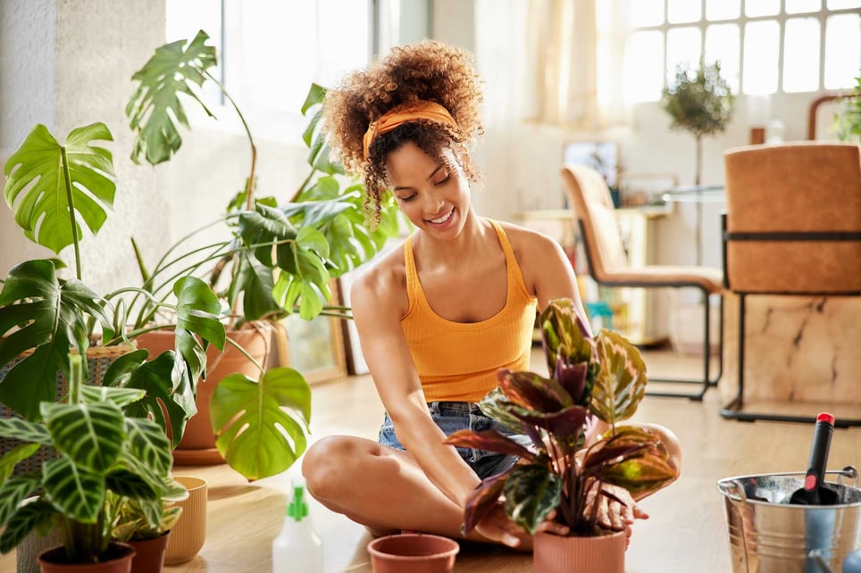Woman-With-Curly-Hair-Planting-mindfulness-activities