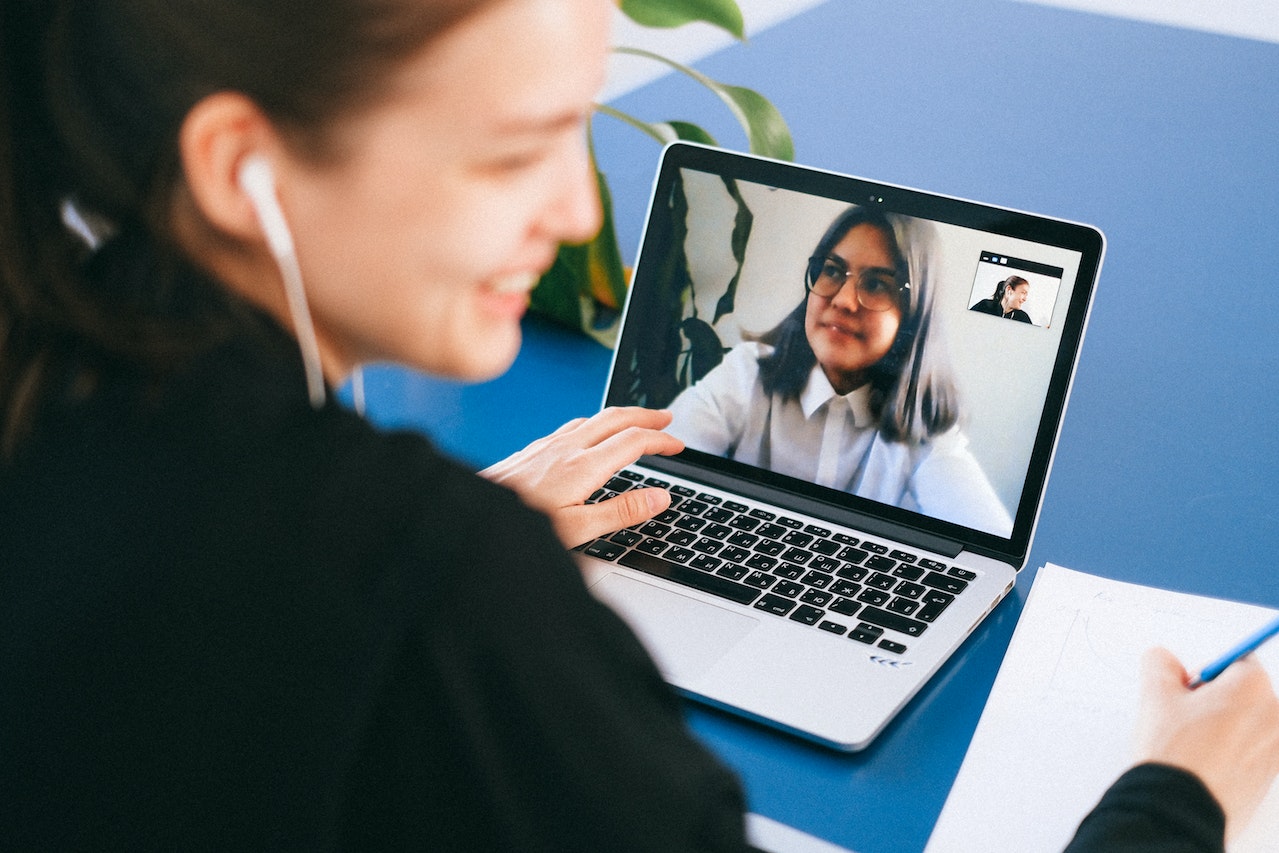 Woman-talking-at-job-interview-via-videocall-elevator-pitch-about-yourself