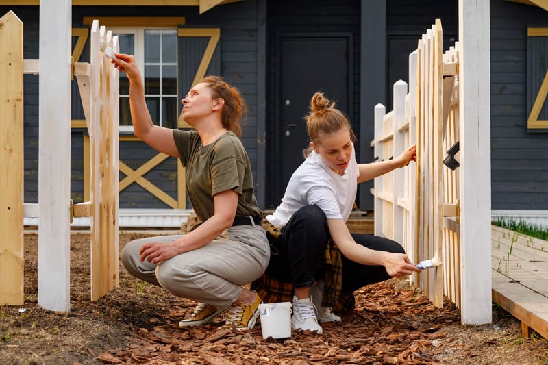 Women-paint-the-fence-of-a-country-house-what-is-a-calling