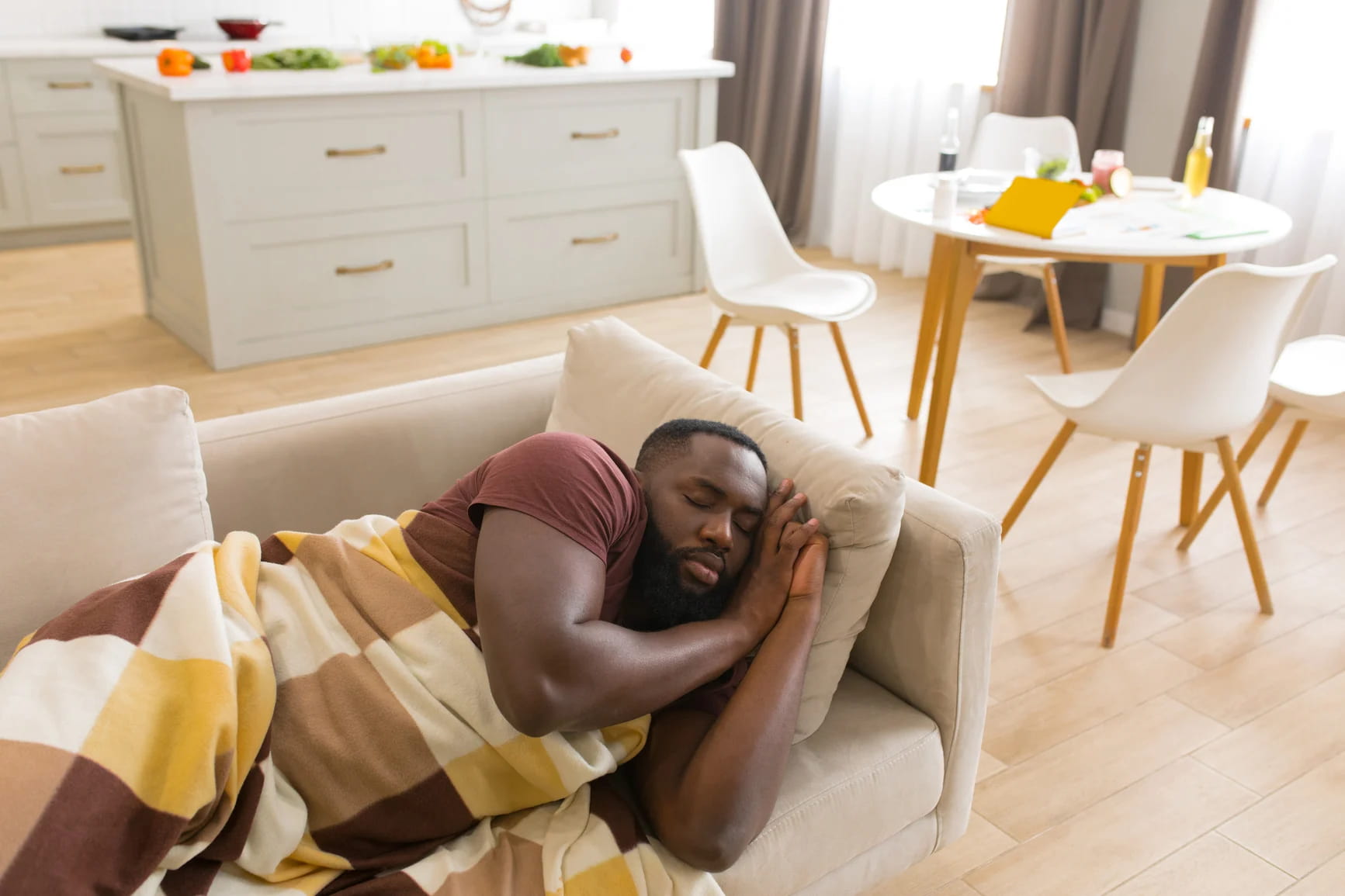 african-american-man-fell-asleep-on-the-sofa-reward-yourself