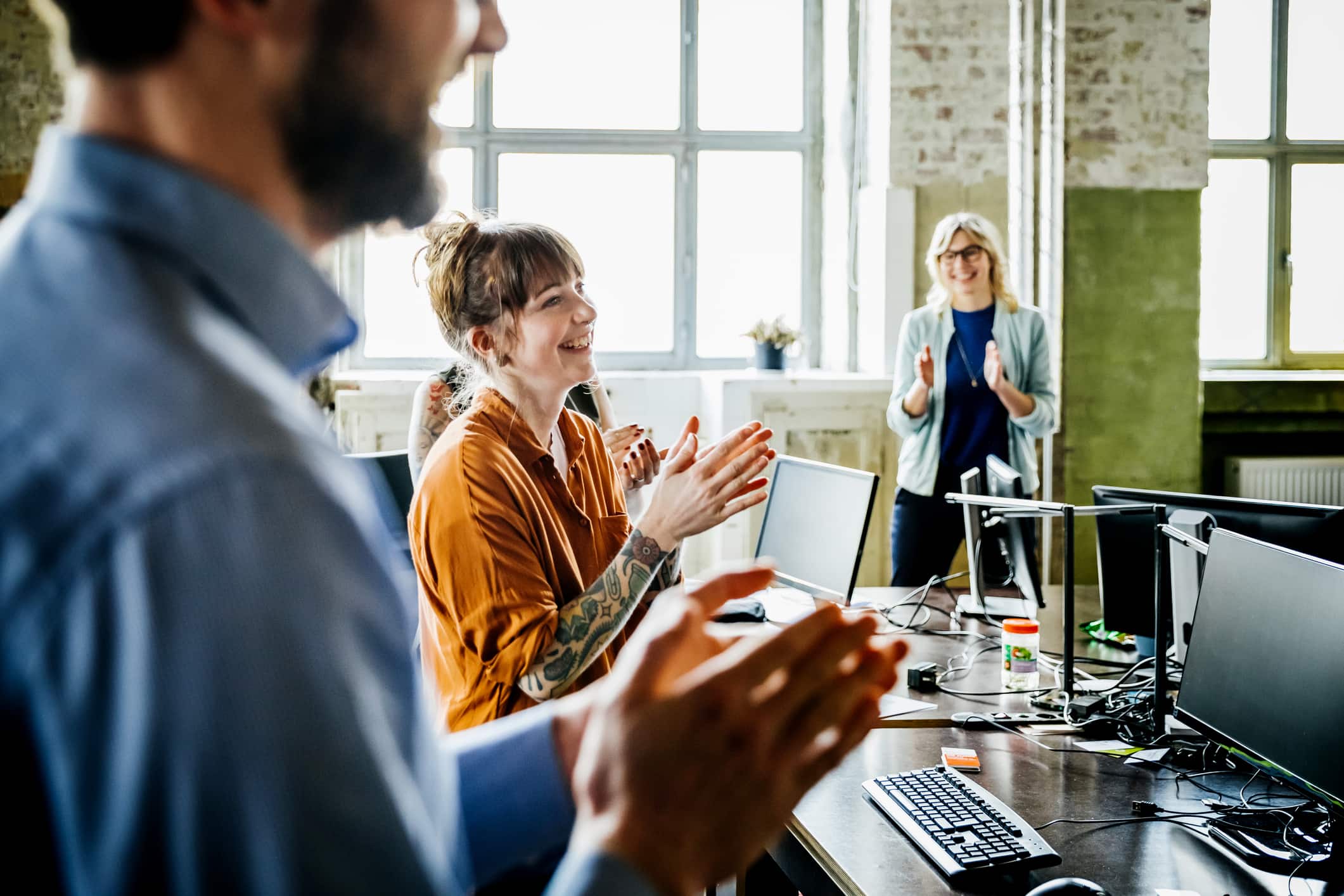 business-people-applauding-to-colleague-in-office-what-is-a-long-term-goal