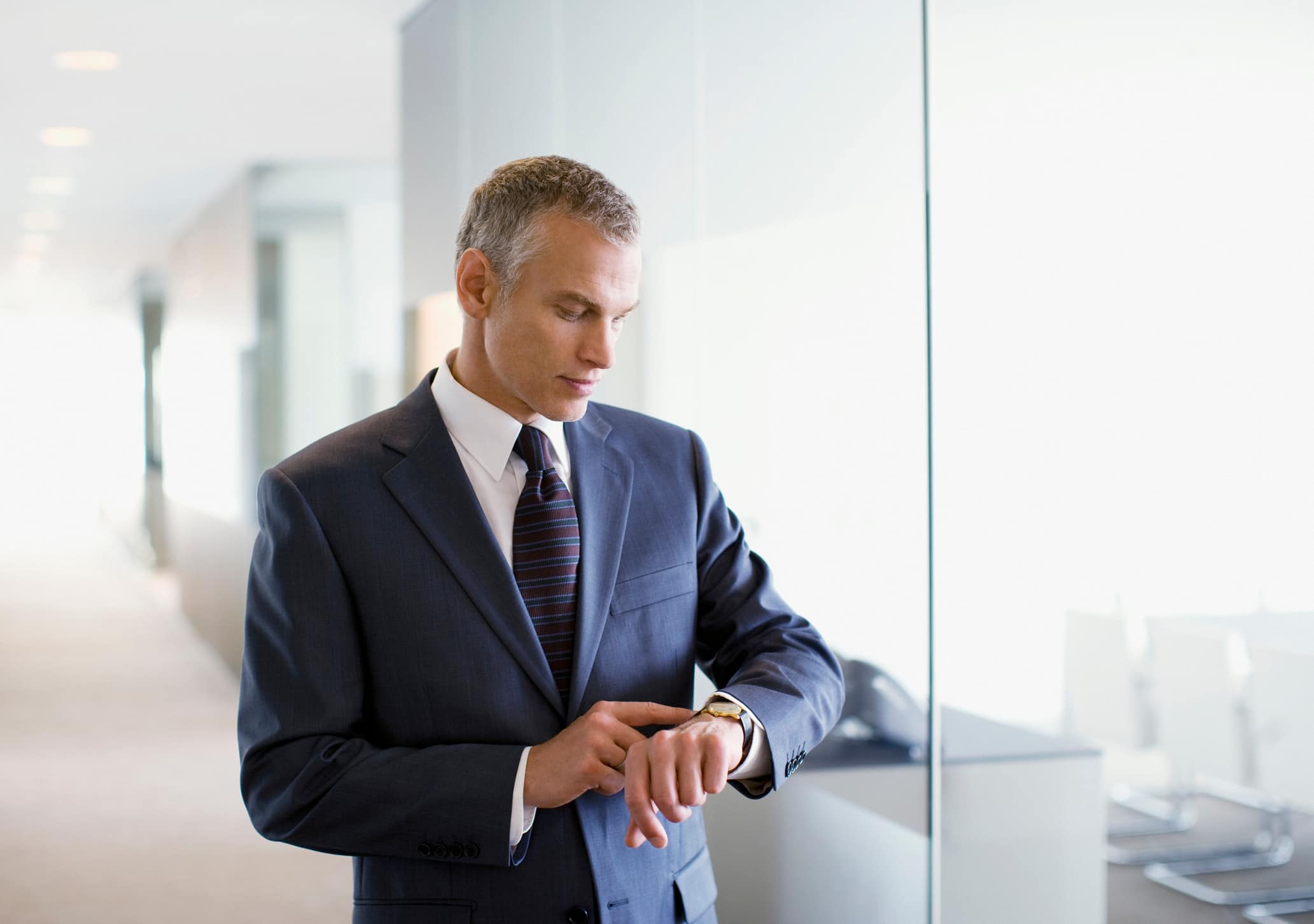 businessman-checking-his-watch-resume-skills-for-resume