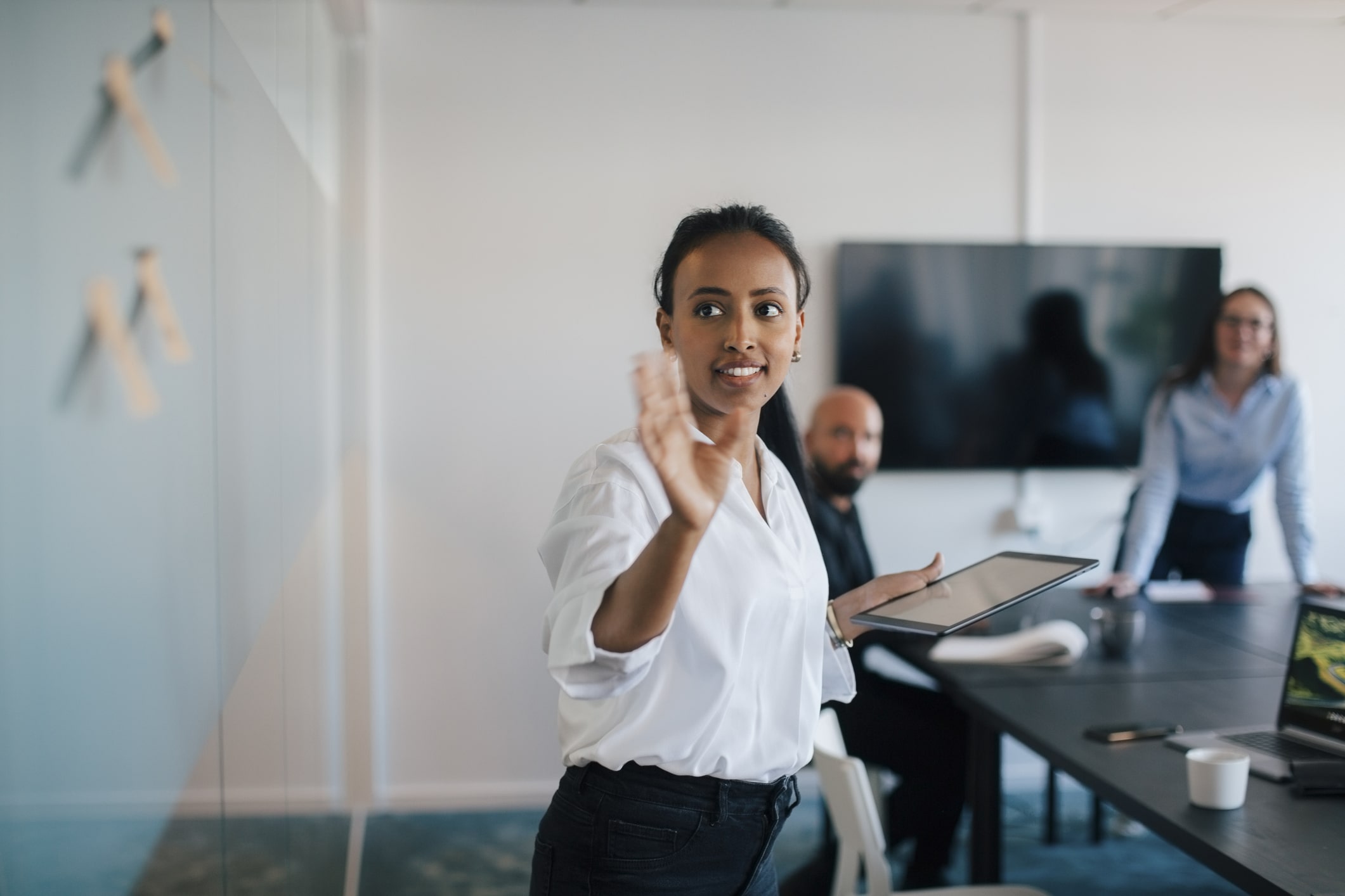 businesswoman-brainstorming-over-adhesive-notes-at-office-social-skills-examples
