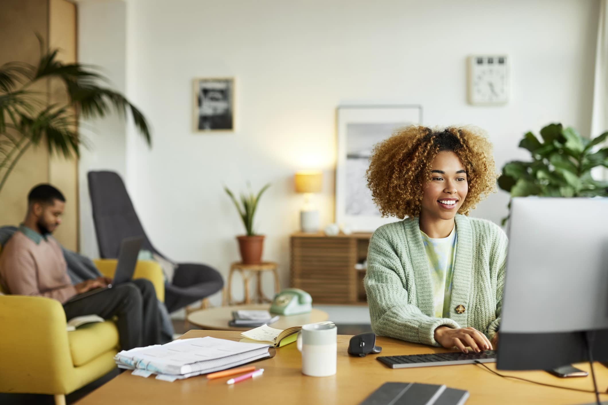 businesswoman-using-computer-in-home-office-what-is-eustress
