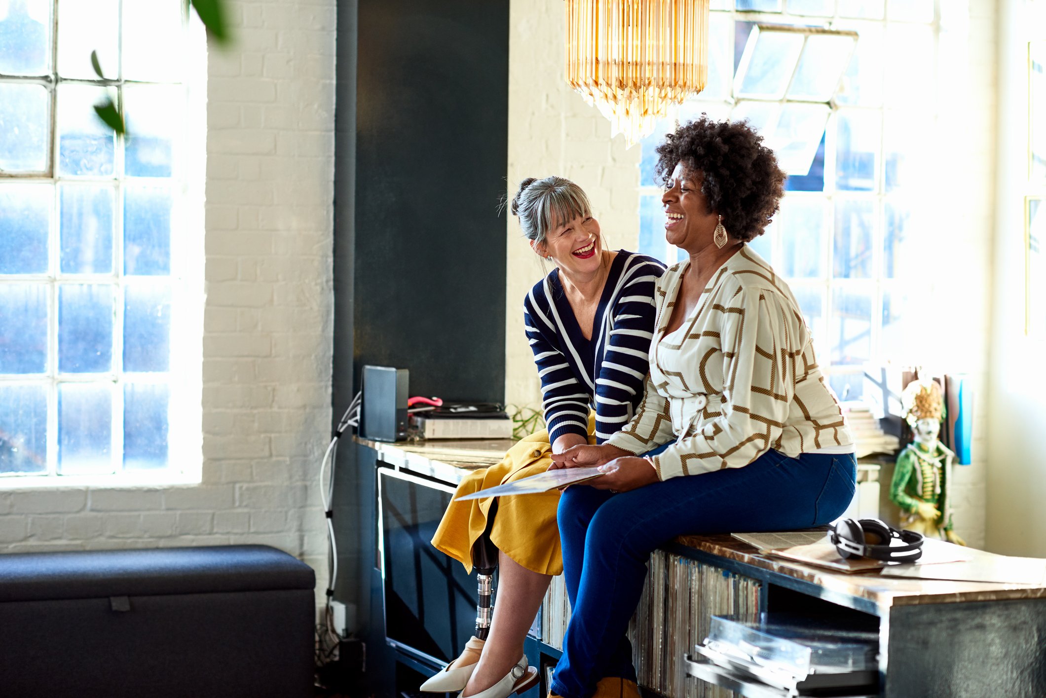 couple-of-coworkers-laughing-how-to-focus-on-your-goals