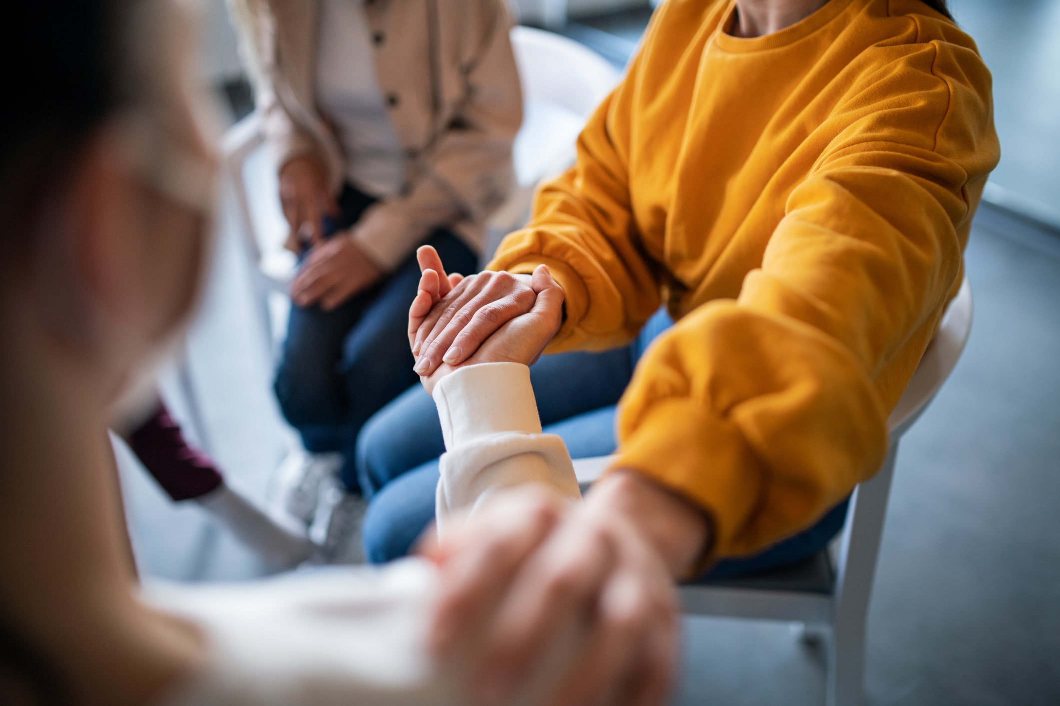 depressed-woman-on-group-therapy-purpose-of-sadness