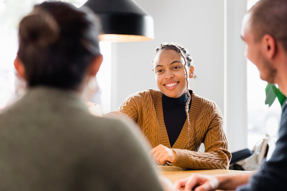 female-applicant-smiling-and-talking-at-job-interview-most-in-demand-jobs