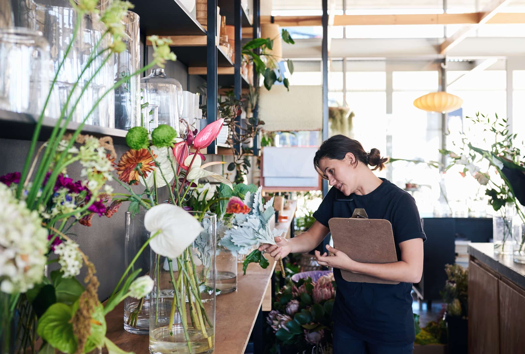 florist-standing-in-her-shop-purpose-vs-mission-vision