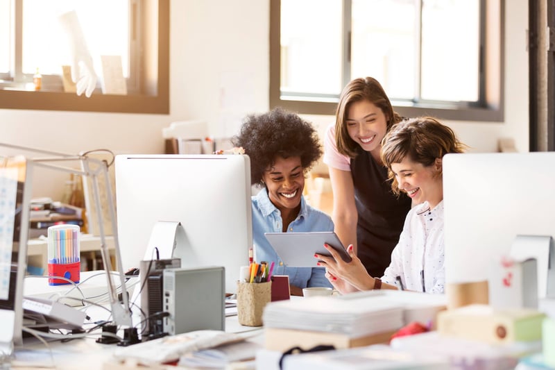 happy-businesswomen-at-office-1