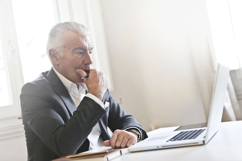 man-determining-what-is-reasonable-severance.package-negotiation