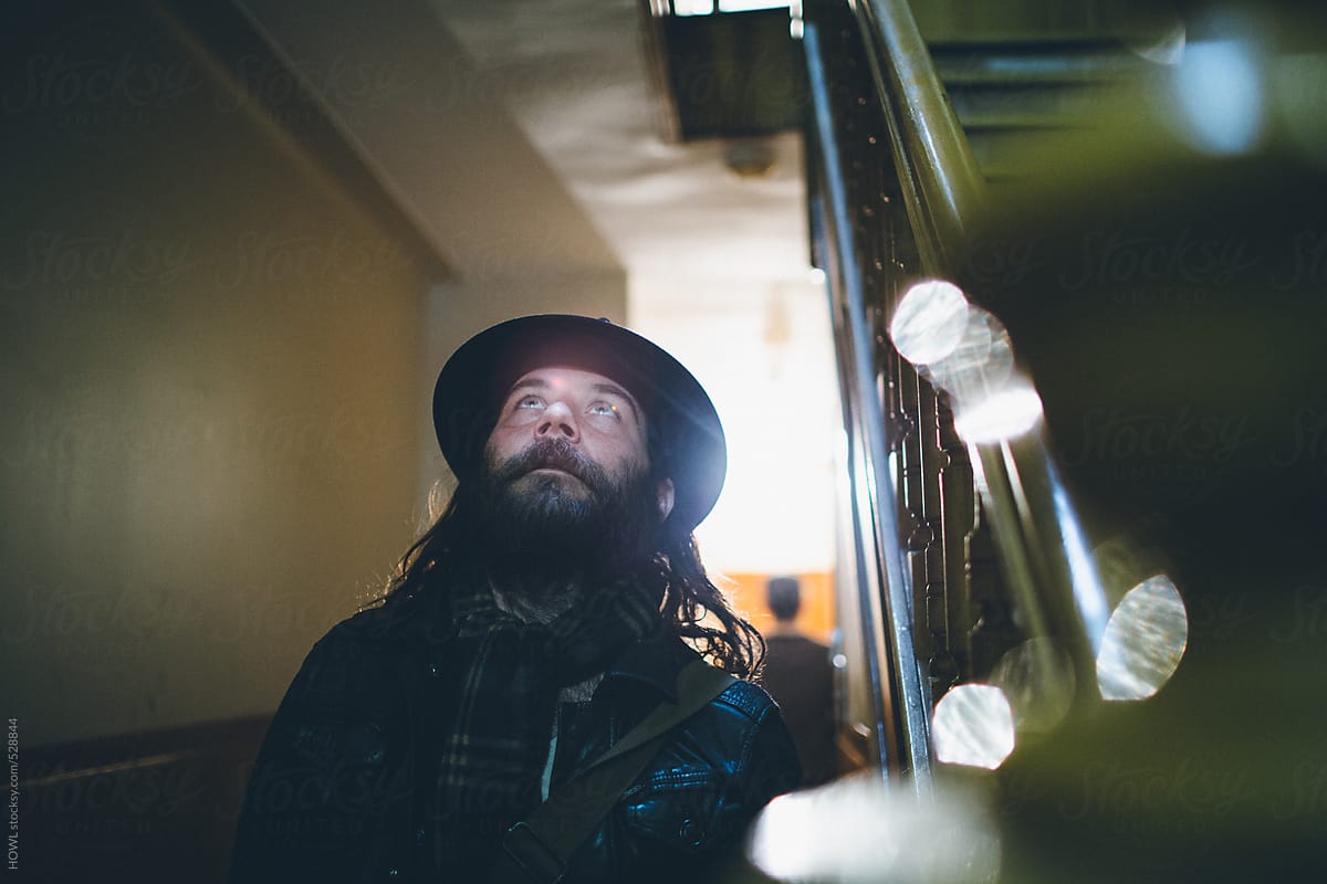 man-in-hat-looking-up-trust-your-gut