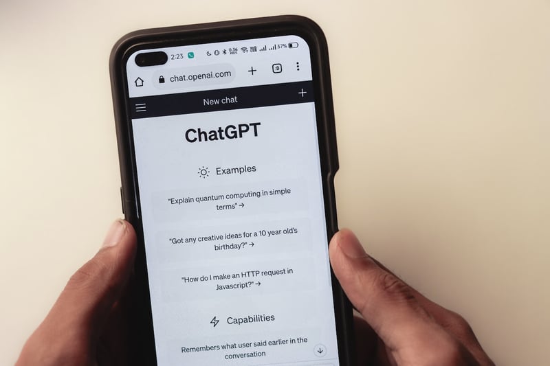 man-opening-chatgpt-in-his-phone-chatgpt-resume