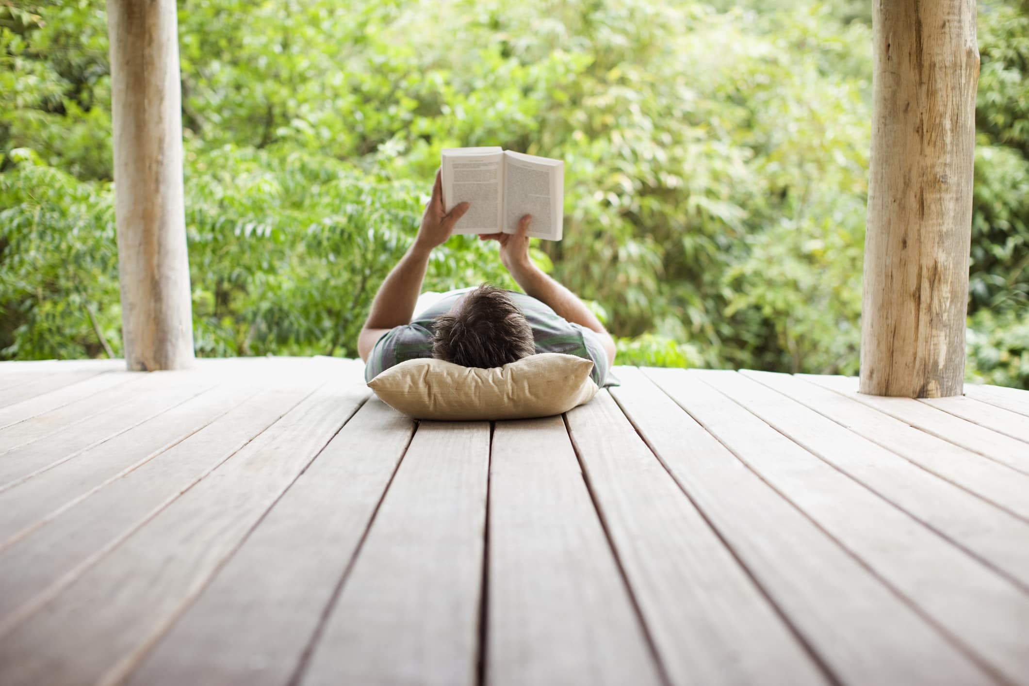 man-reading-on-porch-how-to-be-the-best-version-of-yourself