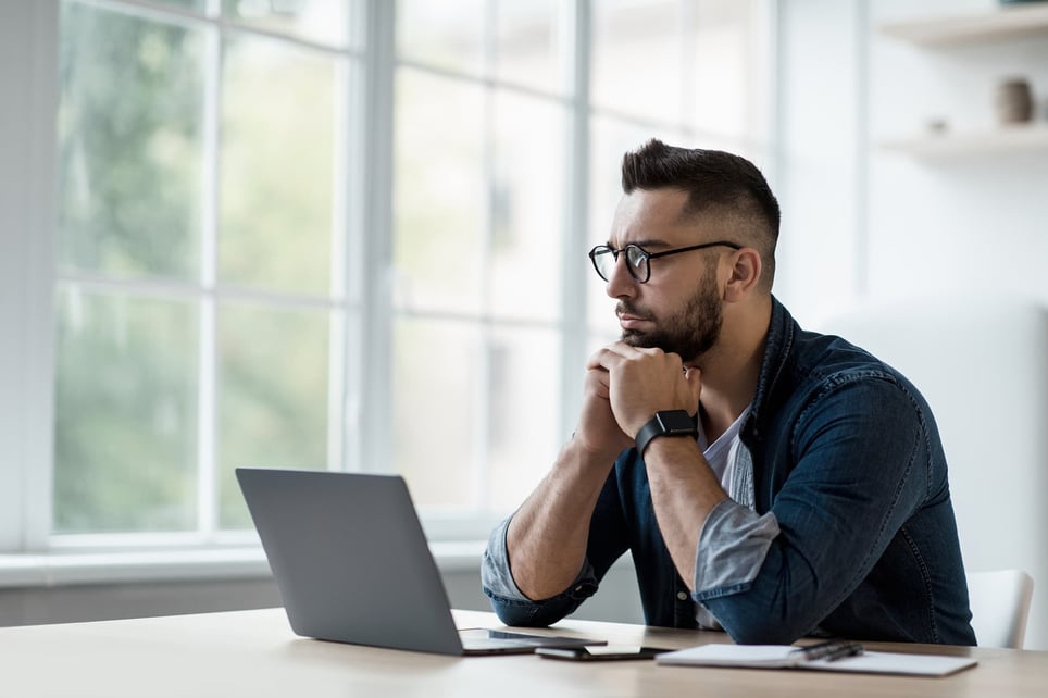 man-reflecting-at-work-how-resilience-can-help-you-with-stress