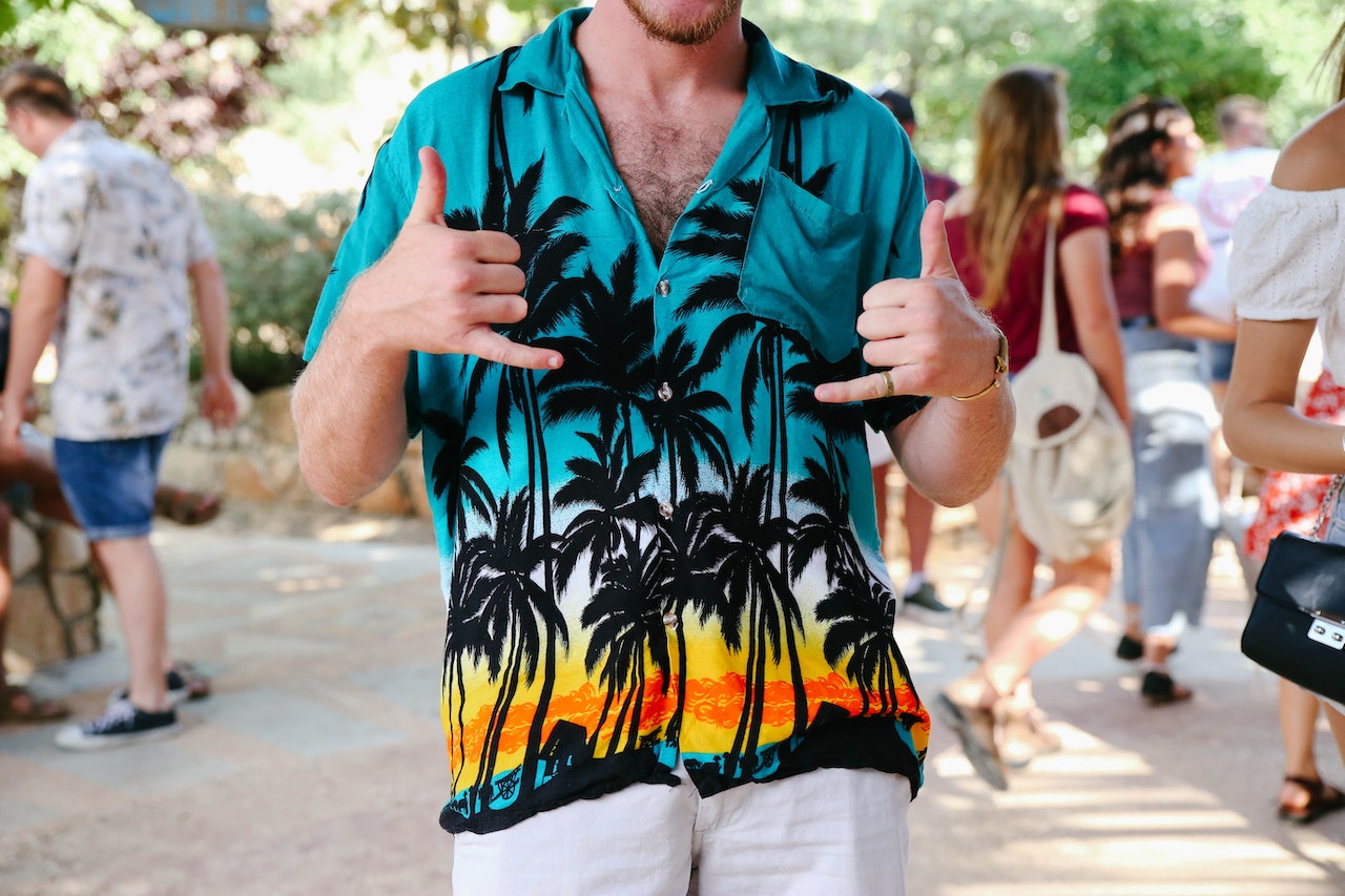 person-doing-the-shaka-sign