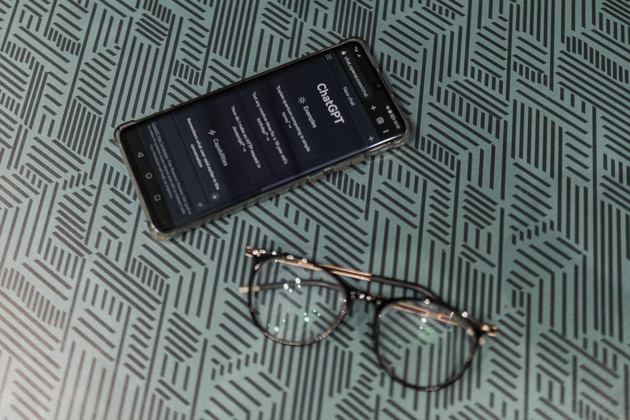 phone-with-chatgpt-open-and-glasses