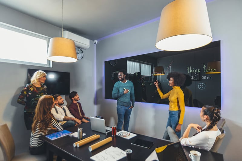 team-discussing-in-office-reskilling