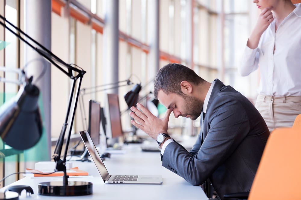 stressed-businessman-at-office-self-awareness-in-leadership