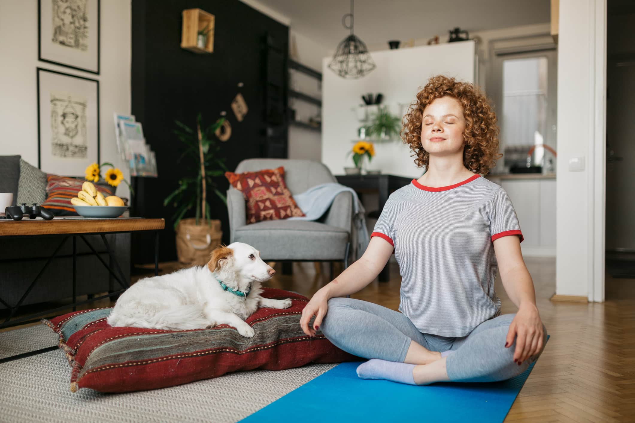 woman-and-her-dog-meditating-what-is-mindfulness