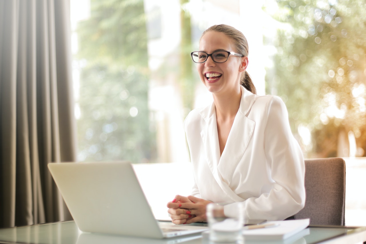 woman-being-happy-and-confident-at-work-self-discovery-questions