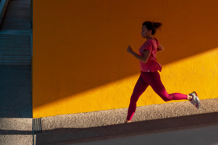 woman-jogging-on-sidewalk-chronic-stress