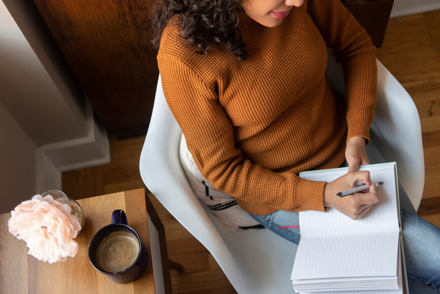 woman-journalling-how-to-recover-from-burnout