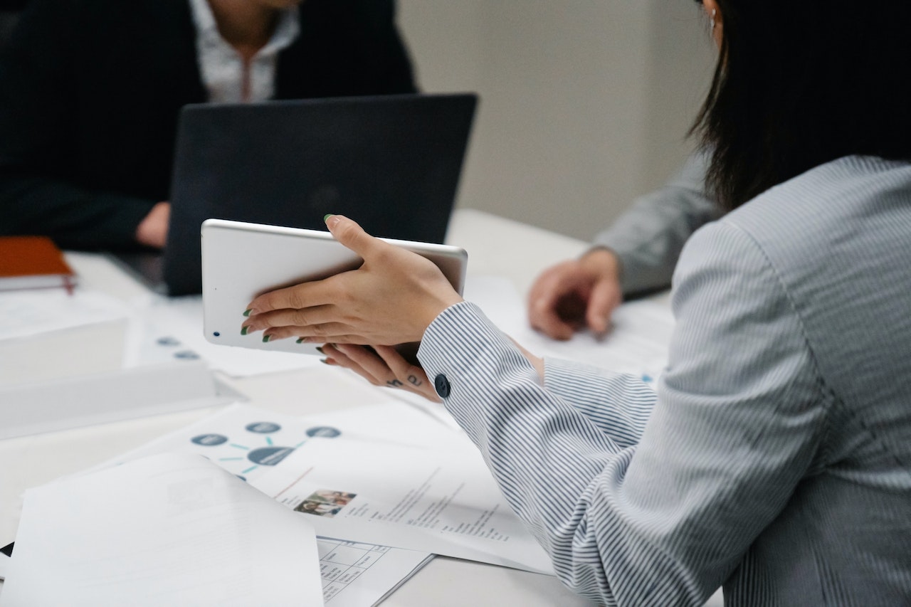 woman-showing-to-boss-her-work-in-ipad