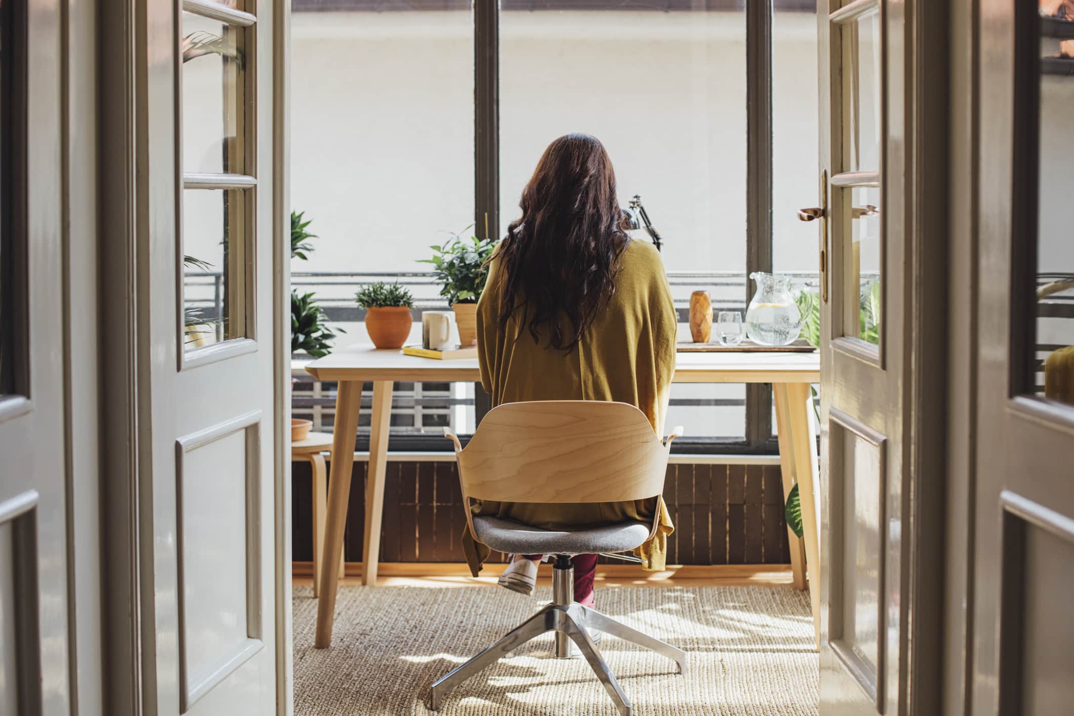 woman-sitting-at-desk-video-interview