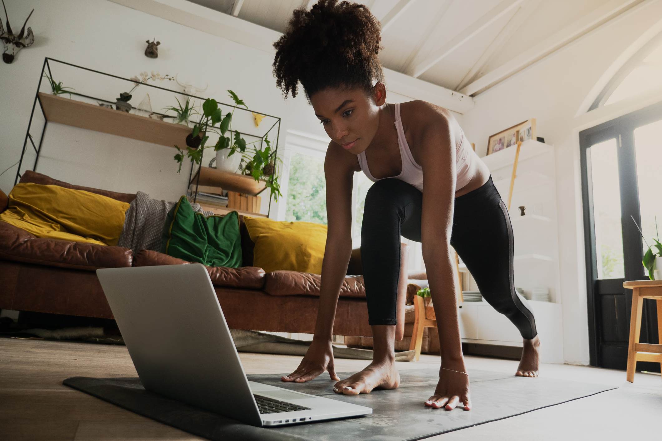 young-mixed-race-woman-working-out-how-to-start-a-manifestation-journal